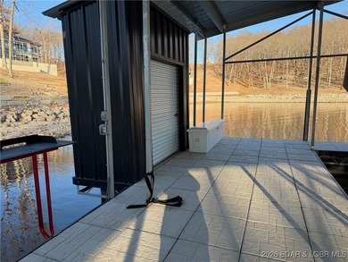 Introducing East Villages! An exquisite lakefront property on The Club At Porto Cima in Missouri - for sale on GolfHomes.com, golf home, golf lot