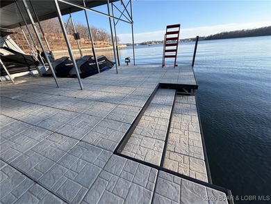 Introducing East Villages! An exquisite lakefront property on The Club At Porto Cima in Missouri - for sale on GolfHomes.com, golf home, golf lot