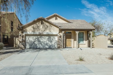 Nestled in the heart of the vibrant Estrella Mountain Ranch on Estrella Mountain Ranch Golf Course in Arizona - for sale on GolfHomes.com, golf home, golf lot