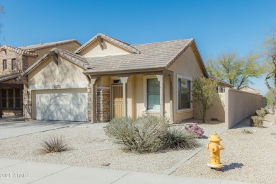 Nestled in the heart of the vibrant Estrella Mountain Ranch on Estrella Mountain Ranch Golf Course in Arizona - for sale on GolfHomes.com, golf home, golf lot