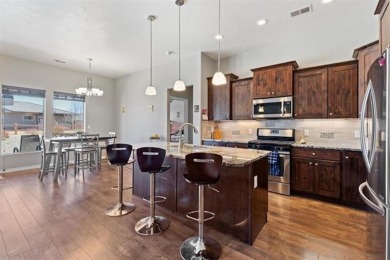 Welcome to this beautifully maintained 4-bedroom, 2-bath home in on Adobe Creek National Golf Course in Colorado - for sale on GolfHomes.com, golf home, golf lot