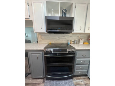 Welcome to this well-maintained and mostly furnished home in a on Lake Henry Golf Club in Florida - for sale on GolfHomes.com, golf home, golf lot