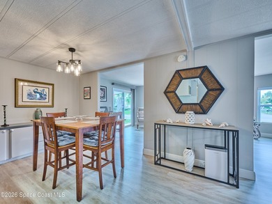 Beautifully updated home offering spacious, relaxed living with on Barefoot Bay Golf Course in Florida - for sale on GolfHomes.com, golf home, golf lot