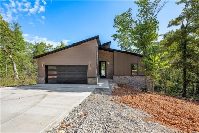 Welcome to this modern new-construction beauty, perfectly on Bella Vista Country Club - Scottsdale in Arkansas - for sale on GolfHomes.com, golf home, golf lot