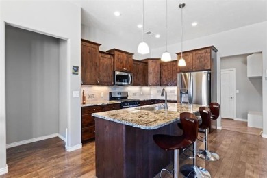 Welcome to this beautifully maintained 4-bedroom, 2-bath home in on Adobe Creek National Golf Course in Colorado - for sale on GolfHomes.com, golf home, golf lot