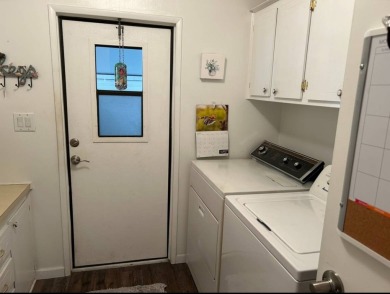 Welcome to this well-maintained and mostly furnished home in a on Lake Henry Golf Club in Florida - for sale on GolfHomes.com, golf home, golf lot