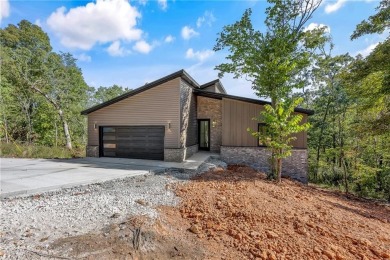 Welcome to this modern new-construction beauty, perfectly on Bella Vista Country Club - Scottsdale in Arkansas - for sale on GolfHomes.com, golf home, golf lot