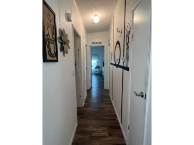 Welcome to this well-maintained and mostly furnished home in a on Lake Henry Golf Club in Florida - for sale on GolfHomes.com, golf home, golf lot