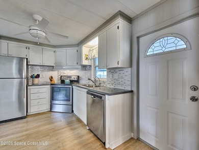 Beautifully updated home offering spacious, relaxed living with on Barefoot Bay Golf Course in Florida - for sale on GolfHomes.com, golf home, golf lot