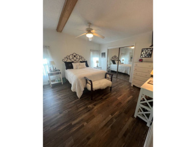 Welcome to this well-maintained and mostly furnished home in a on Lake Henry Golf Club in Florida - for sale on GolfHomes.com, golf home, golf lot