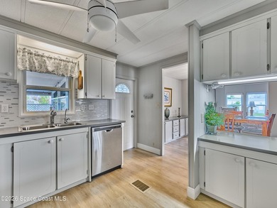 Beautifully updated home offering spacious, relaxed living with on Barefoot Bay Golf Course in Florida - for sale on GolfHomes.com, golf home, golf lot