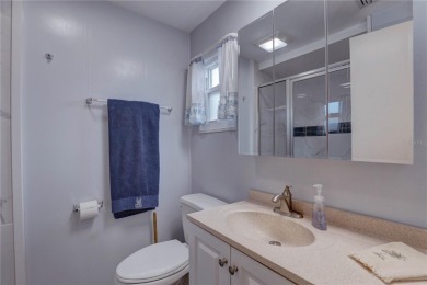 Your Resort-Style Oasis Awaits at 113 Royal Palms Circle, Largo on Palm Hill Golf Club in Florida - for sale on GolfHomes.com, golf home, golf lot