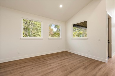 Welcome to this modern new-construction beauty, perfectly on Bella Vista Country Club - Scottsdale in Arkansas - for sale on GolfHomes.com, golf home, golf lot