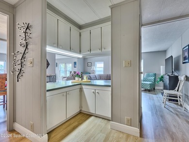 Beautifully updated home offering spacious, relaxed living with on Barefoot Bay Golf Course in Florida - for sale on GolfHomes.com, golf home, golf lot