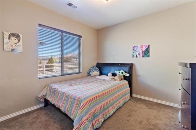 Welcome to this beautifully maintained 4-bedroom, 2-bath home in on Adobe Creek National Golf Course in Colorado - for sale on GolfHomes.com, golf home, golf lot