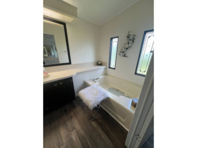 Welcome to this well-maintained and mostly furnished home in a on Lake Henry Golf Club in Florida - for sale on GolfHomes.com, golf home, golf lot