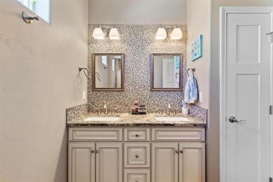 Welcome to this beautifully maintained 4-bedroom, 2-bath home in on Adobe Creek National Golf Course in Colorado - for sale on GolfHomes.com, golf home, golf lot