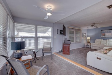 Your Resort-Style Oasis Awaits at 113 Royal Palms Circle, Largo on Palm Hill Golf Club in Florida - for sale on GolfHomes.com, golf home, golf lot