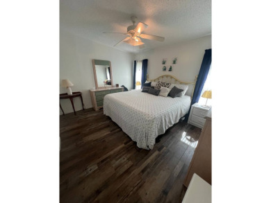 Welcome to this well-maintained and mostly furnished home in a on Lake Henry Golf Club in Florida - for sale on GolfHomes.com, golf home, golf lot