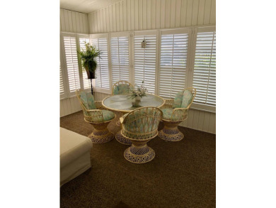 Welcome to this well-maintained and mostly furnished home in a on Lake Henry Golf Club in Florida - for sale on GolfHomes.com, golf home, golf lot