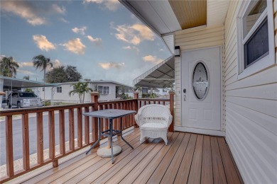 Your Resort-Style Oasis Awaits at 113 Royal Palms Circle, Largo on Palm Hill Golf Club in Florida - for sale on GolfHomes.com, golf home, golf lot
