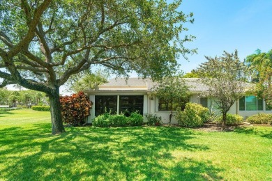 Sun-filled 2-bedroom villa with views of the golf course on Hunters Run Golf and Country Club in Florida - for sale on GolfHomes.com, golf home, golf lot