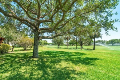 Sun-filled 2-bedroom villa with views of the golf course on Hunters Run Golf and Country Club in Florida - for sale on GolfHomes.com, golf home, golf lot