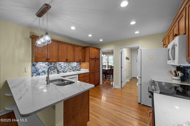 Beautifully maintained brick home on a private corner lot in the on Taberna Country Club in North Carolina - for sale on GolfHomes.com, golf home, golf lot