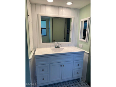 This is a second floor end unit with split bedrooms. Floors are on Copperhead Golf Club in Florida - for sale on GolfHomes.com, golf home, golf lot