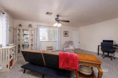 Welcome to your dream sanctuary! This one-story home has two on Coyote Willows Golf Club in Nevada - for sale on GolfHomes.com, golf home, golf lot