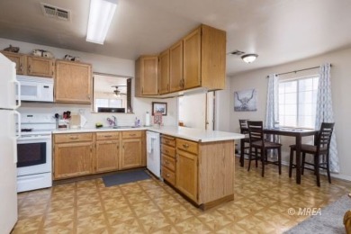 Welcome to your dream sanctuary! This one-story home has two on Coyote Willows Golf Club in Nevada - for sale on GolfHomes.com, golf home, golf lot