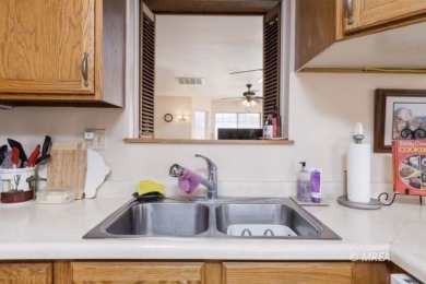 Welcome to your dream sanctuary! This one-story home has two on Coyote Willows Golf Club in Nevada - for sale on GolfHomes.com, golf home, golf lot
