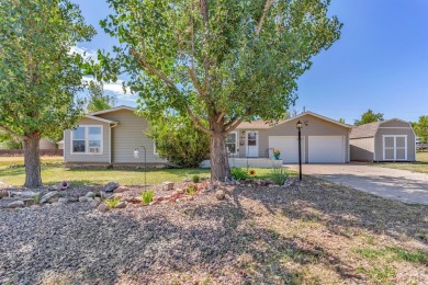 Don't miss out on this well-maintained home located in beautiful on Hollydot Golf Course in Colorado - for sale on GolfHomes.com, golf home, golf lot