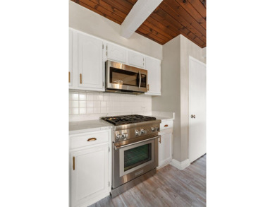 This 2 BED 3 BATH 2000 sq ft RANCH home is nestled  on a wooded on Lakes of the Four Seasons Country Club in Indiana - for sale on GolfHomes.com, golf home, golf lot