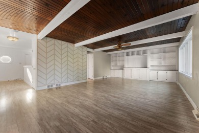 This 2 BED 3 BATH 2000 sq ft RANCH home is nestled  on a wooded on Lakes of the Four Seasons Country Club in Indiana - for sale on GolfHomes.com, golf home, golf lot