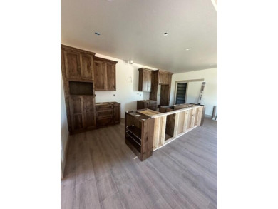 This beautiful new home in the Powder Horn Golf Community offers on The Powder Horn Golf Club - Mountain in Wyoming - for sale on GolfHomes.com, golf home, golf lot