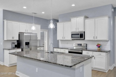 Move right into this immaculate, one-of-a-kind Poseidon-built on Eagle Landing Golf Club in Florida - for sale on GolfHomes.com, golf home, golf lot