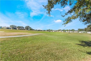 This perfectly sized 3 bedroom, 2 bathroom, 2 car garage Golf on Monarch At Royal Highlands in Florida - for sale on GolfHomes.com, golf home, golf lot