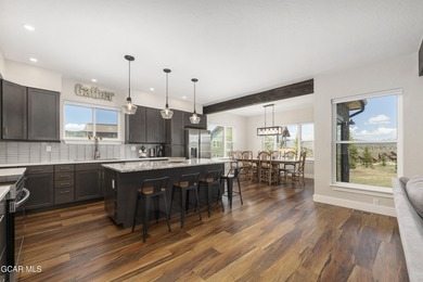 This stunning 4-bed, 3-bath mountain retreat combines luxury on Grand Elk Ranch and Club in Colorado - for sale on GolfHomes.com, golf home, golf lot