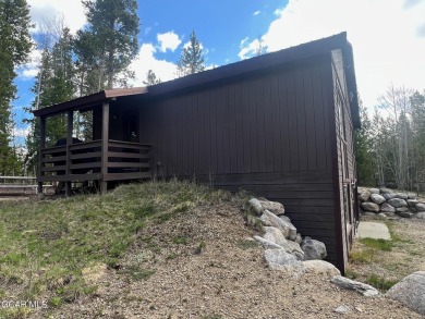 This 3bd/2ba Columbine Lake home on a 1/3 acre lot is situated on Grand Lake Golf Course in Colorado - for sale on GolfHomes.com, golf home, golf lot