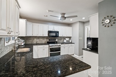 Welcome to this vintage gem in the heart of Tega Cay's peninsula on Tega Cay Golf Club in South Carolina - for sale on GolfHomes.com, golf home, golf lot