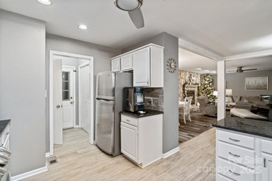 Welcome to this vintage gem in the heart of Tega Cay's peninsula on Tega Cay Golf Club in South Carolina - for sale on GolfHomes.com, golf home, golf lot