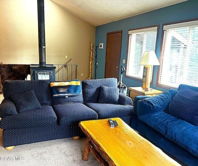 This 3bd/2ba Columbine Lake home on a 1/3 acre lot is situated on Grand Lake Golf Course in Colorado - for sale on GolfHomes.com, golf home, golf lot