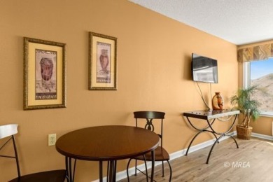 VACATION RENTALS ALLOWED! This Lovely 1 Bedroom 1 Bathroom fully on The Oasis Golf Club in Nevada - for sale on GolfHomes.com, golf home, golf lot