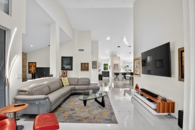 Experience luxury in this renovated 2nd-floor penthouse located on Broken Sound Golf and Club  in Florida - for sale on GolfHomes.com, golf home, golf lot