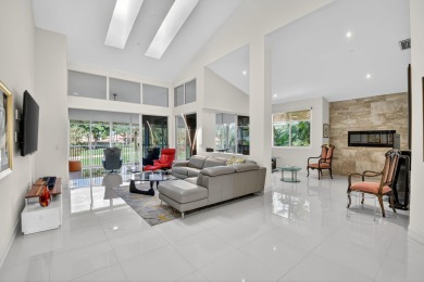 Experience luxury in this renovated 2nd-floor penthouse located on Broken Sound Golf and Club  in Florida - for sale on GolfHomes.com, golf home, golf lot