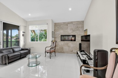 Experience luxury in this renovated 2nd-floor penthouse located on Broken Sound Golf and Club  in Florida - for sale on GolfHomes.com, golf home, golf lot
