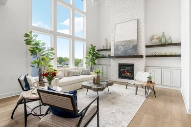 This is a MODEL HOME.  You will want to see this gorgeous brand on Heritage Park Golf Course in Kansas - for sale on GolfHomes.com, golf home, golf lot