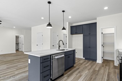 New construction on the 8th hole at Rock Creek! This home offers on Rock Creek Country Club in North Carolina - for sale on GolfHomes.com, golf home, golf lot