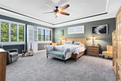 This stunning 5-bed, 5-bath Jones Homes masterpiece with water on Eagle Creek Golf Club in Florida - for sale on GolfHomes.com, golf home, golf lot